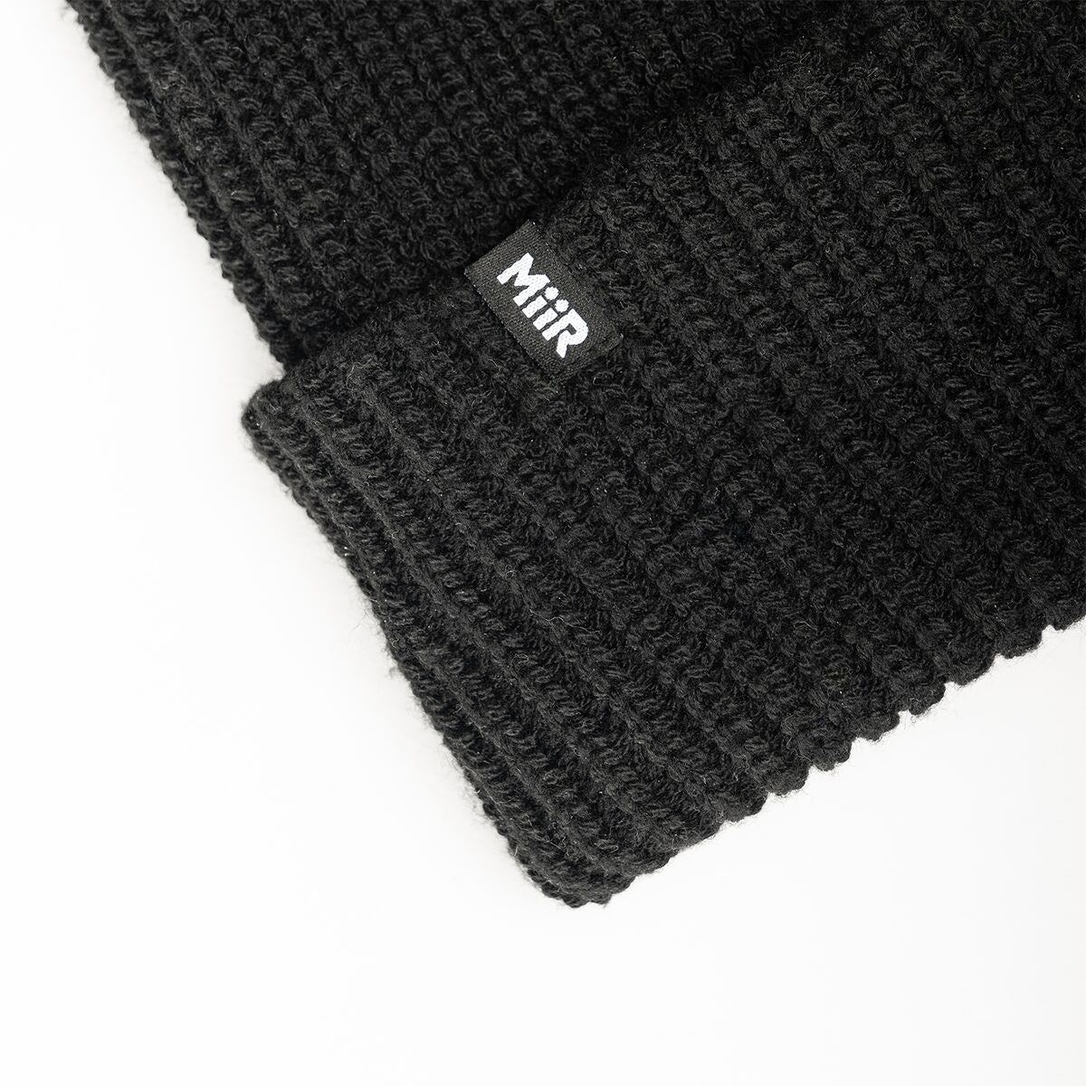 recycled-poly-rib-beanie-d5 WebPDP-RecycledPolyRibBeanie_Studio_TagDetail_Black__BNE002002OS.jpg
